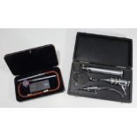 An audiologist's cased set together with a Carl Zeiss heat thermometers and a German Nursing