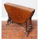 A Victorian burr walnut Sutherland table, of oval form, raised on reeded supports to scrolled legs