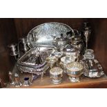 SECTION 36. Silver-plated wares including a large glass lined tureen and cover, rose bowls, butter