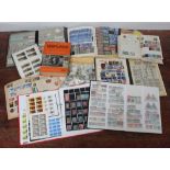 A collection of used GB and world stamps across ten albums and some loose leaves, largely ERII