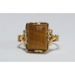 An 18ct Tiger's eye ring, rectangular stone, weighing 4.8 grams