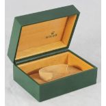 A Rolex wristwatch retail box reference 64.00.02 with fitted and lined interior and branded