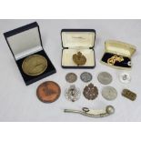 A Bosun's call together with an RAF sweetheart brooch, a silver gilt Buffalo badge and tie pin,
