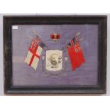 A WW1 Sailor's Silkwork picture with central framed oval b&w photograph under a crown and flanked by