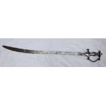 A 19th century Mameluke sword with curved flat blade, the grip with knuckle-bow and circular pommel,