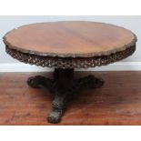 19th century Anglo-Indian hardwood circular tilt-top supper table, the edge, sides and column