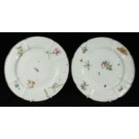 A pair of 18th century Chelsea porcelain dessert plates of lobed shape with moulded flower sprays