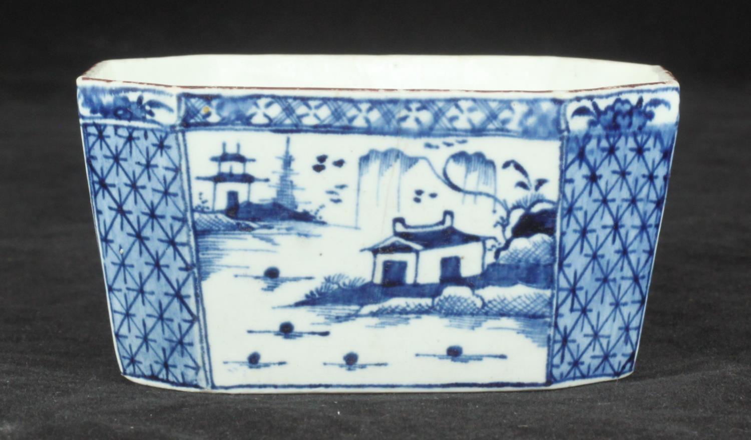 A Derby porcelain blue and white butter tub of elongated octagonal form, c1760, decorated with