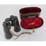 A pair of Hilkinson Field 20x60 binoculars with lens caps, in red velvet brown leather case