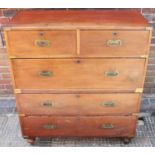 A 19th century brass-bound walnut, two-section campaign chest of two short, over three long drawers,