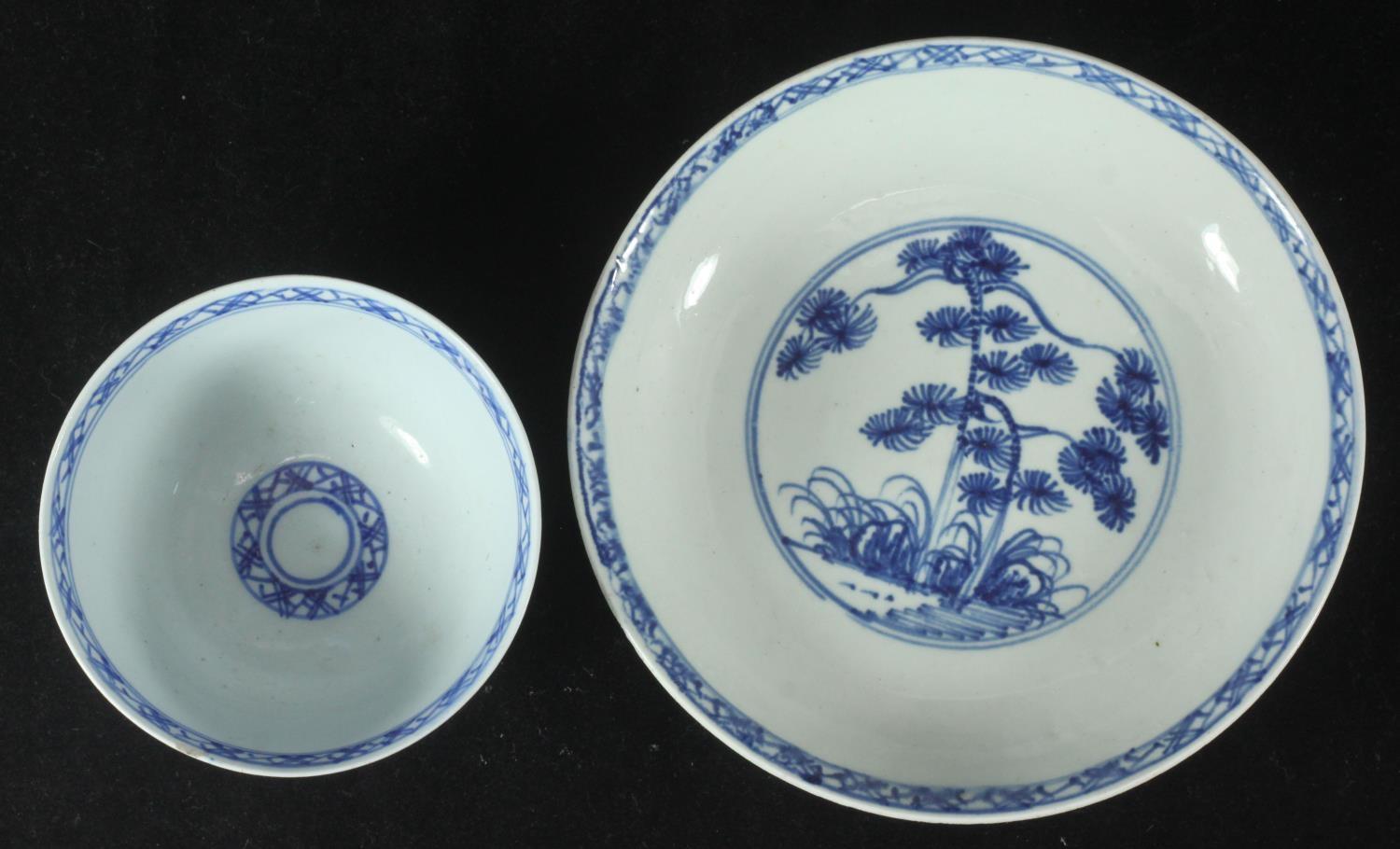 A William Ball Liverpool Porcelain tea bowl and matching saucer, decorated with pine trees and - Image 2 of 3