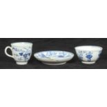 A Bow porcelain miniature tea bowl, saucer and coffee cup painted in underglaze blue in the '