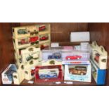 SECTION 49. A collection of approximately 24 assorted boxed die-cast model cars including a Dinky