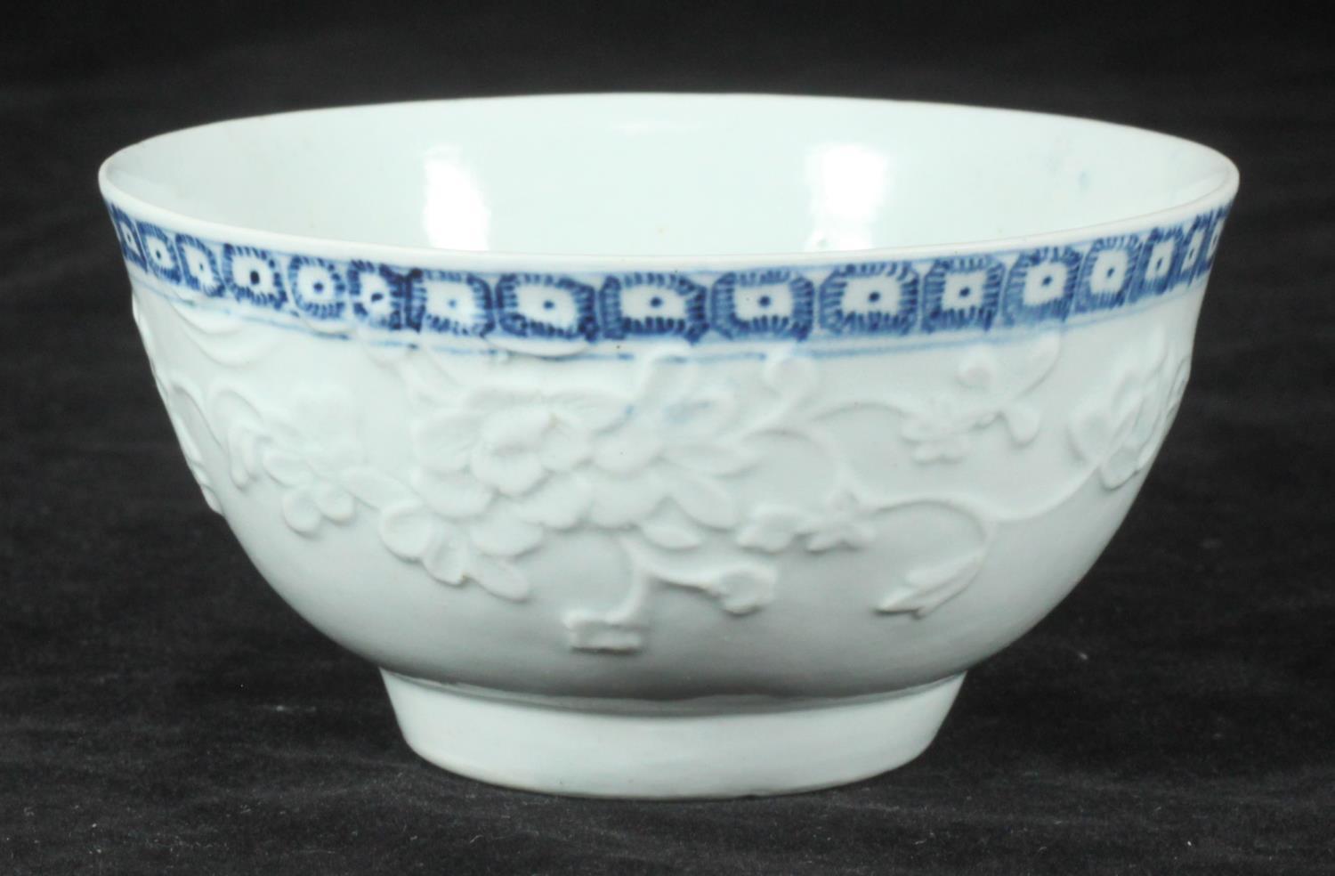 A Richard Chaffers Liverpool steatitic porcelain bowl, with applied peony flower decoration, and