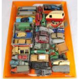 Approximately thirty various toy cars mainly Dinky, including a boxed Triang caravan, boxed Buick