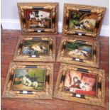 A set of six 20th century unsigned studies of cats, oils on board, all in matching ornately