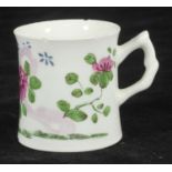 A Bow porcelain mug of waisted cylindrical form with crabstock handle, decorated in Famille Rose