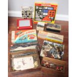 A wooden box containing five layers of Meccano parts and tools, a modern box of Meccano, two Etch