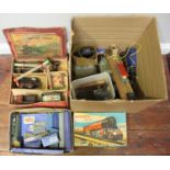 A Hornby 600 mechanical loco with track, signals, rolling stock, etc. with box, together with two