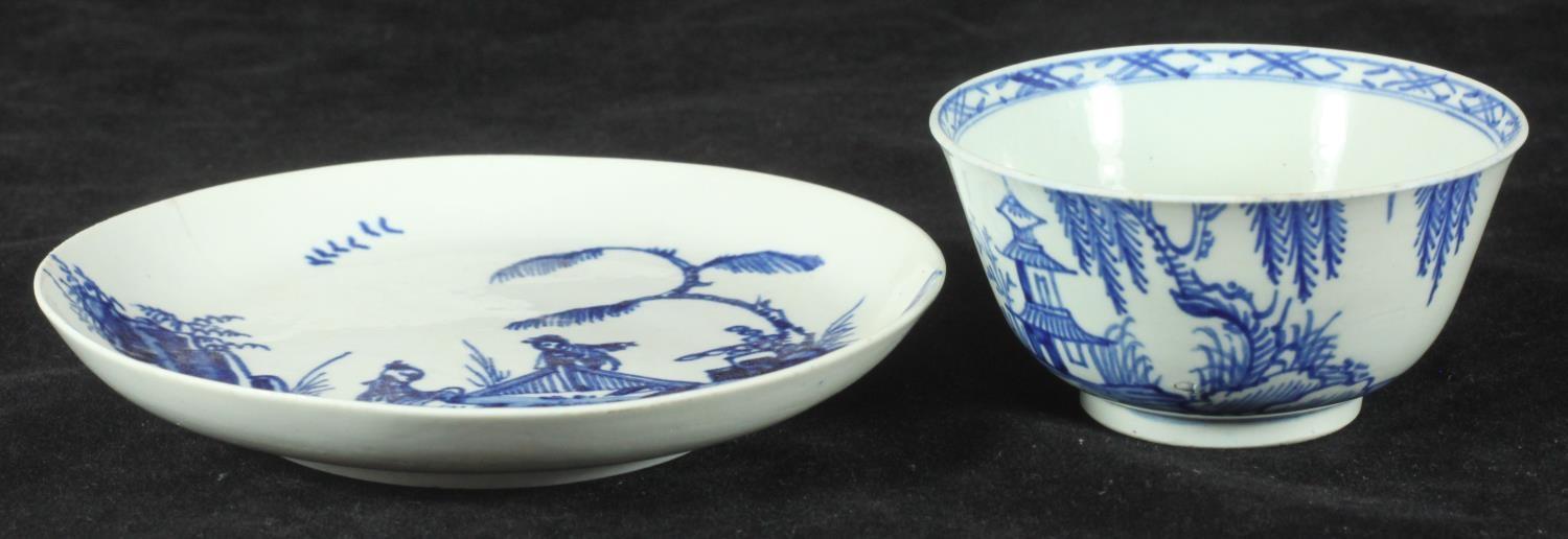 A William Ball Liverpool porcelain tea bowl, c1756, decorated in underglaze blue with a pagoda and