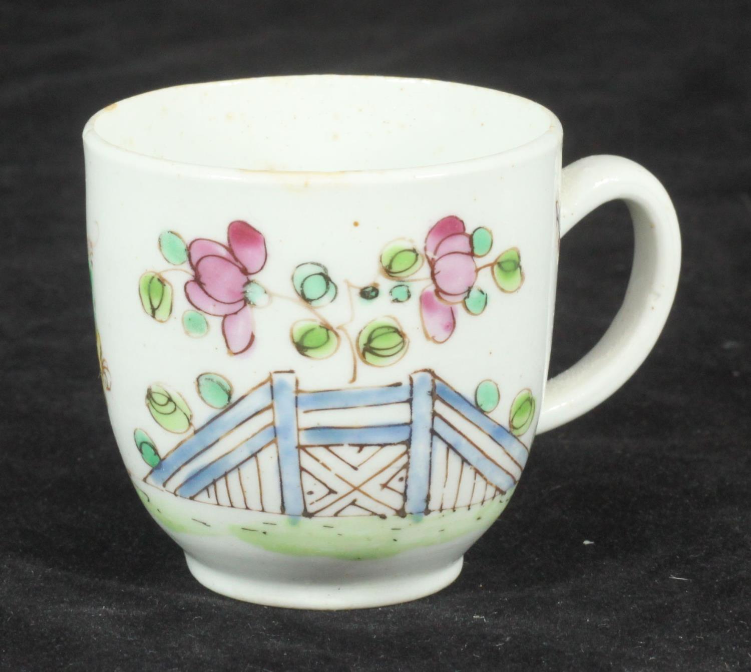 A Bow porcelain coffee cup, c1753-55, decorated in polychrome enamels with exotic bird, insect,