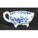 A Bow porcelain blue & white butter boat, c1760, of teardrop shape with flower-capped handle and