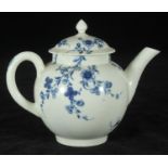 A Worcester porcelain small globular teapot and cover, c1760, decorated in underglaze with the