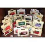 SECTION 38. A collection of approximately 35 assorted boxed die-cast model vehicles, predominantly