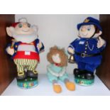 Two 'Blyton's Toyland' musical figures, Big Ears and Mr Plod, on circular bases, 40cm tall, together