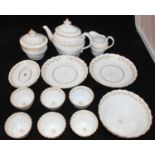 A New Hall porcelain part tea-set, with spiral fluted decoration and bands of gilt leaves,