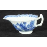 A Bow porcelain cream boat painted in underglaze blue in the 'Desirable Residence' pattern, No. '56'