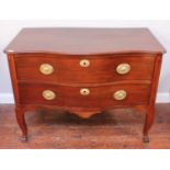 A 19th century stained mahogany serpentine chest of two long drawers, with brass pulls and