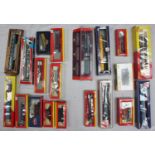 Nine various '00' gauge locomotives, Lima and Hornby, and eleven goods wagons and coaches, various