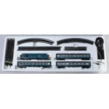 A Hornby Railways Electric Train Set model no. R825-9140 00-511 with loco, three carriages, power