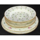 An 18th century Derby porcelain part dinner or dessert service, comprising four side plates and