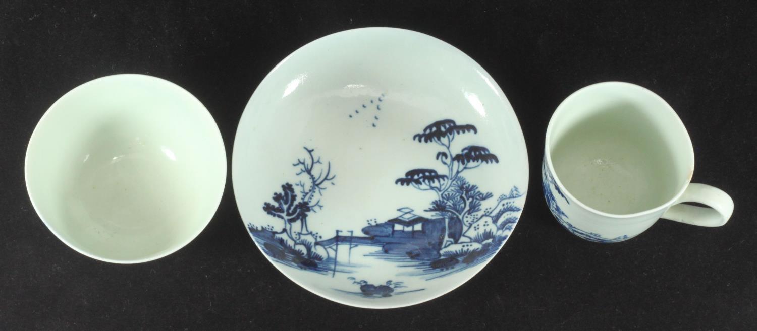 A Richard Chaffers Liverpool porcelain trio of tea bowl, saucer and coffee cup, decorated in - Image 2 of 3