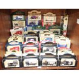 SECTION 54. A collection of approximately 65 assorted boxed die-cast model vehicles, predominantly