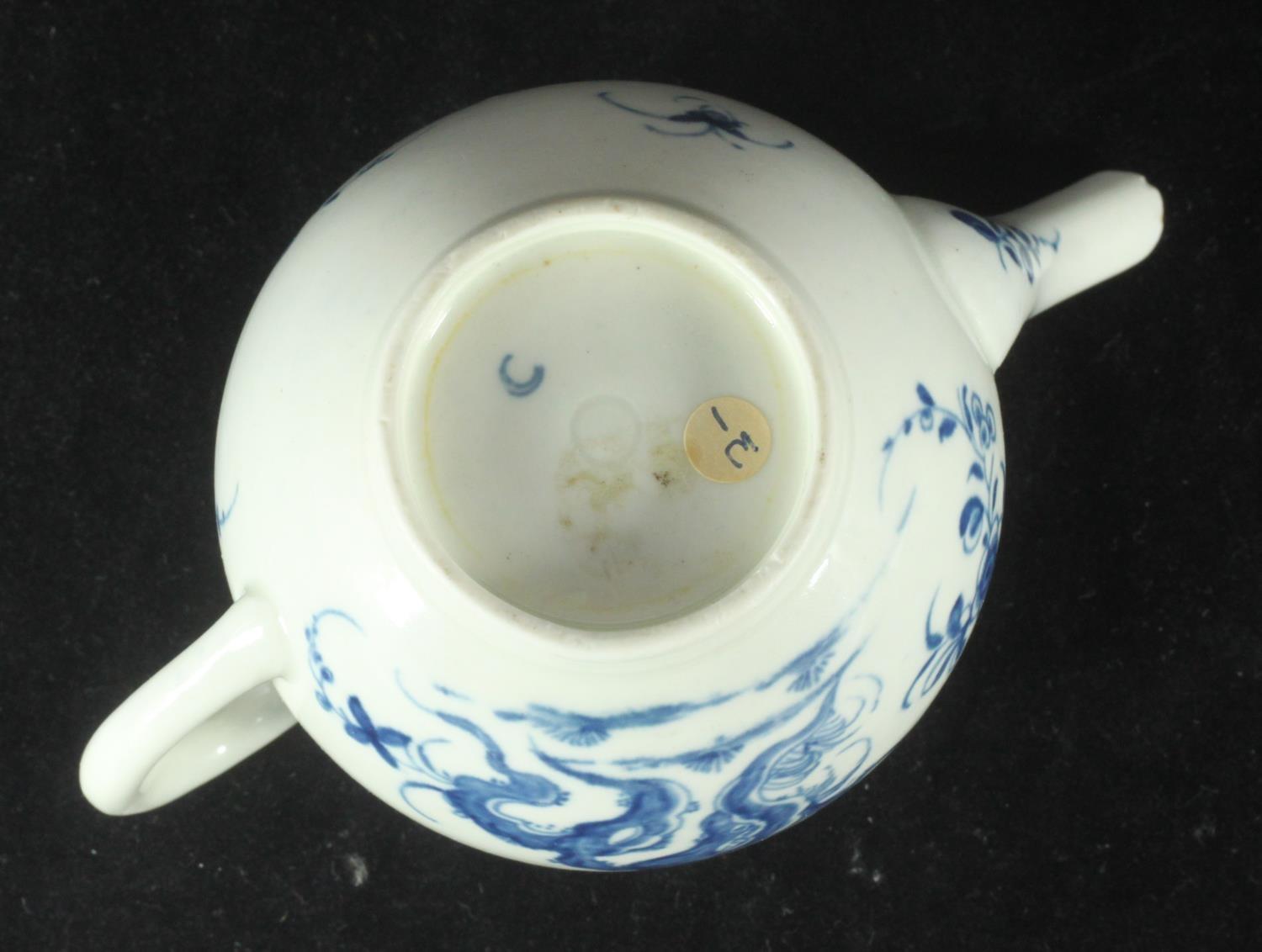 A Worcester porcelain small globular teapot and cover, c1760, decorated in underglaze with the - Image 3 of 3