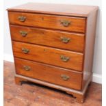 A Georgian mahogany chest of drawers comprising four long graduated drawers with later replacement