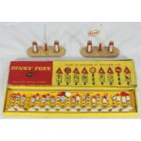 A Dinky Toys 772 boxed set of 24 British Road Signs, together with two Dinky 'Esso' twin petrol