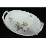 A Chelsea porcelain Red Anchor period oval two-handled basket, with rustic handles and applied