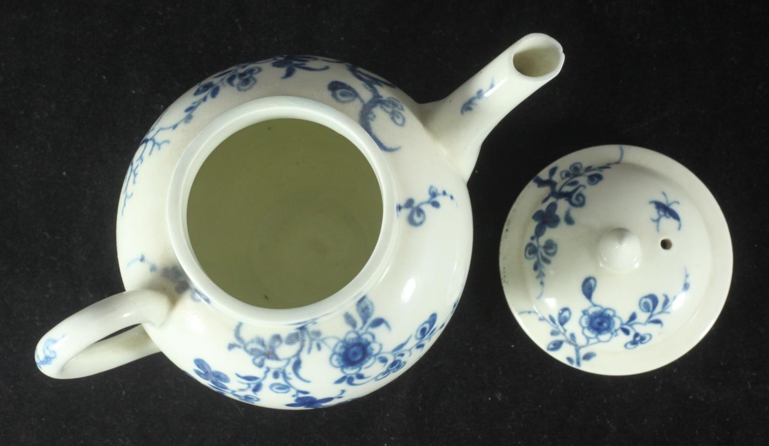 A Worcester porcelain small globular teapot and cover, c1760, decorated in underglaze with the - Image 2 of 3