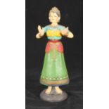 A mid-20th century Indian painted composition four-piece dancing Thanjavur doll, 30cm high