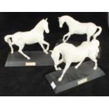 Three Beswick porcelain models of white horses, 'Spirit of Freedom,' 'Spirit of the Wind' and Spirit
