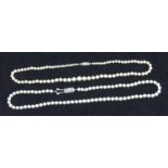 A set of graduated cultured pearls (worn), together with a set of uniformed cultured pearls by