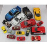 A collection of assorted scale model and die-cast cars including a Maisto Lamborghini Diablo, Burago