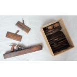 A wooden smoothing plane and a collection of 12 wooden moulding planes (af)