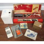 A boxed Trix Twin Railways '00' gauge three-rail set, comprising two engines, transformer and