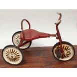 A vintage child's tricycle by Mobo