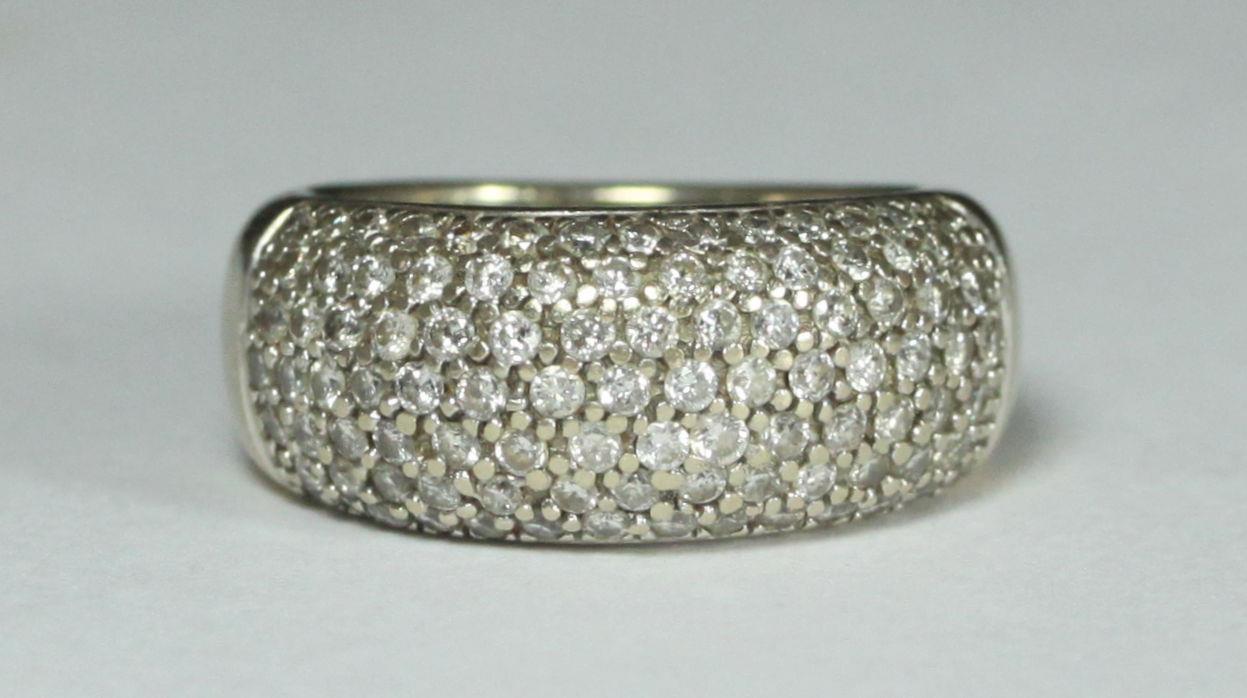 An 18ct white gold wide band pave-set with 1.00 carat of RBC diamonds. Total weight of ring 11. - Image 2 of 2